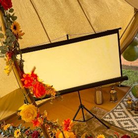 Movie night tent setup with projector and screen
